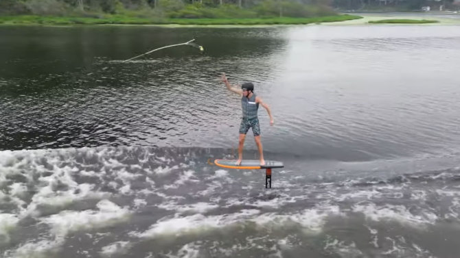 Click to go to the wake foiling blog A wake foiler tosses the tow rope aside to glide on the boat's waves